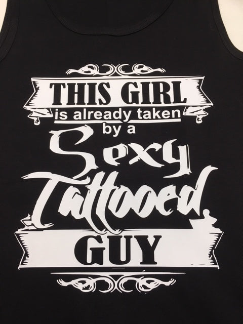 This girl is already taken by a sexy tattooed guy tank