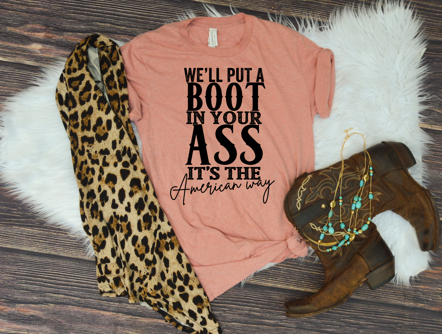 We'll put a boot in your ass, its the American way women's top